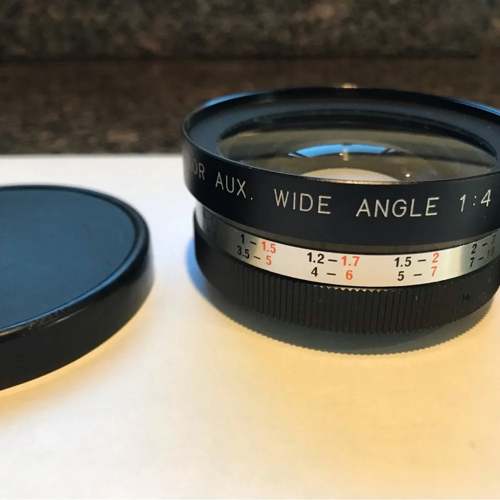 Yashikor aux wide angle and telephoto 1:4 lens